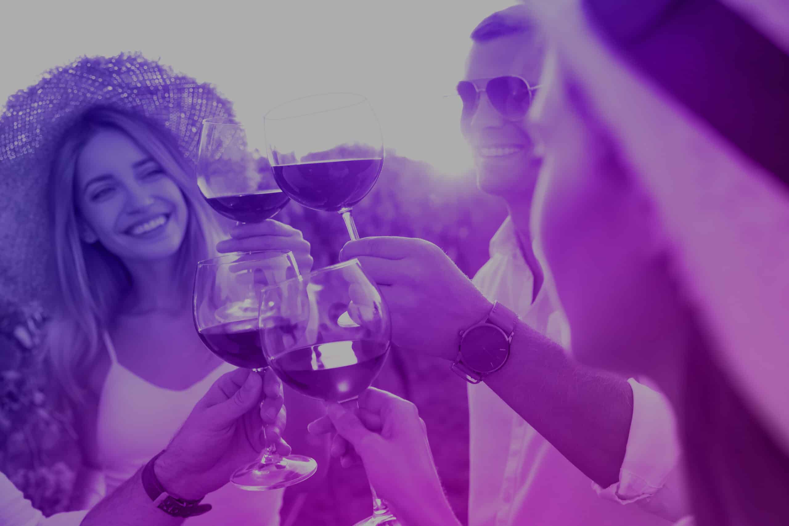 Group of friends toasting with wine - header image