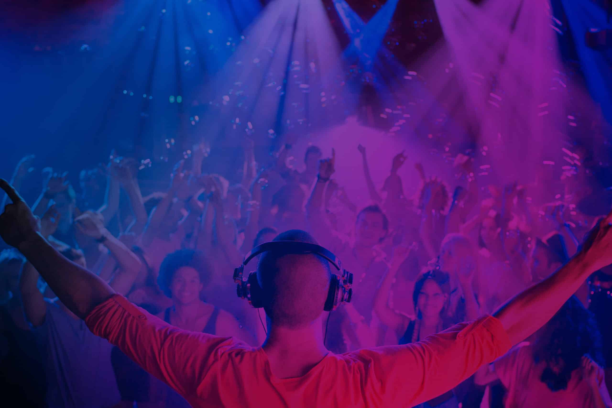 DJ at a club with audience - header image