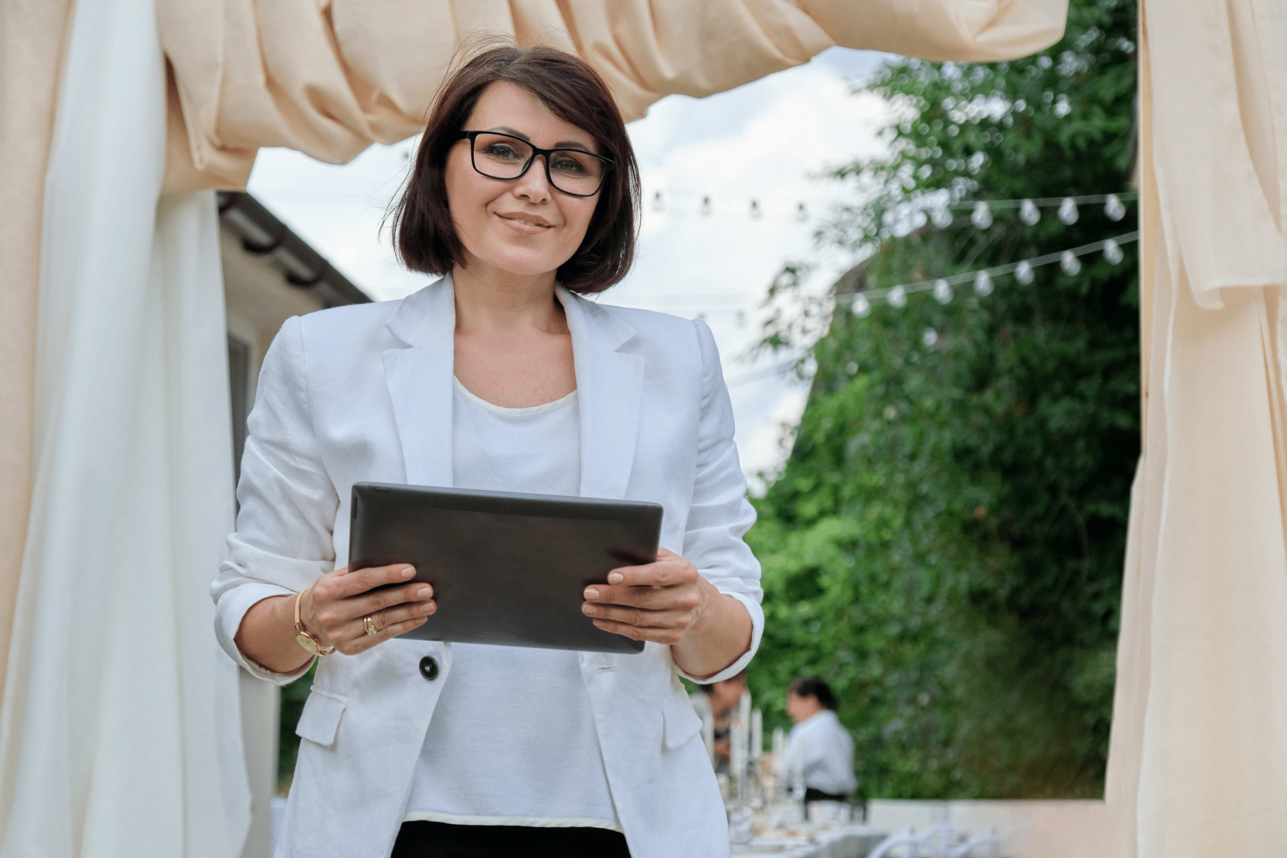 event organizer holding a clipboard