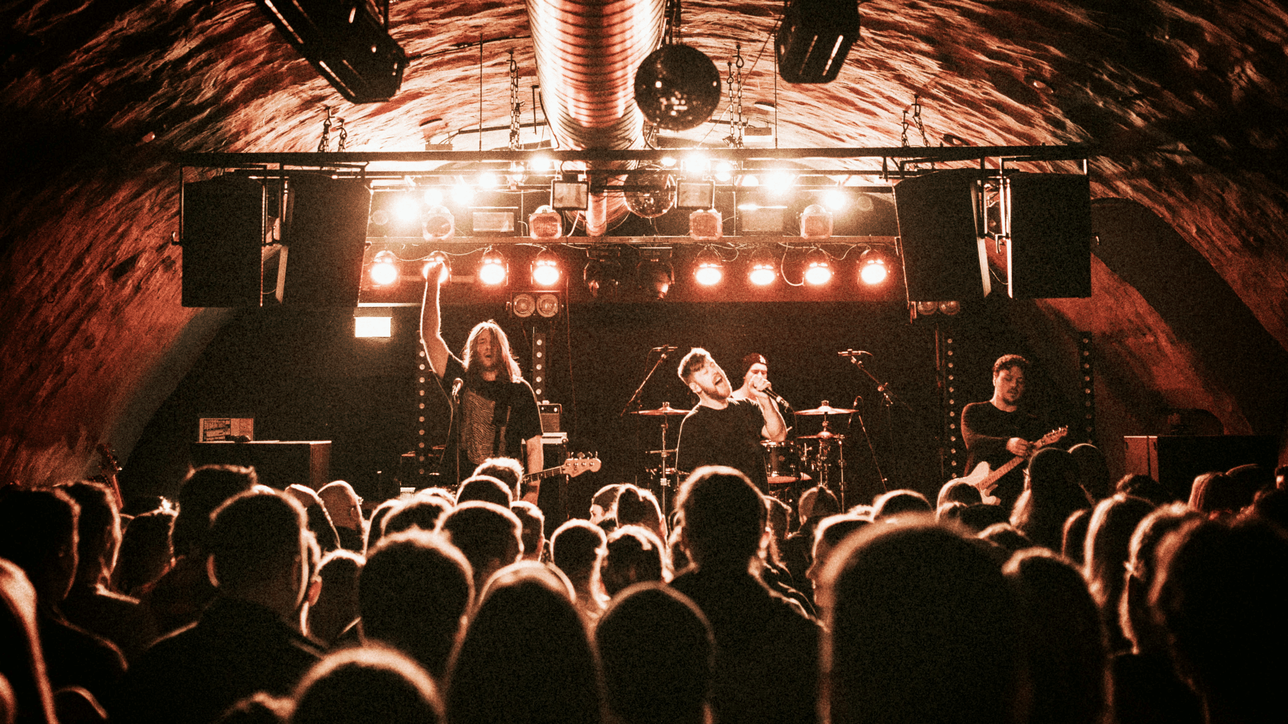 rock band performing at a sold out underground show